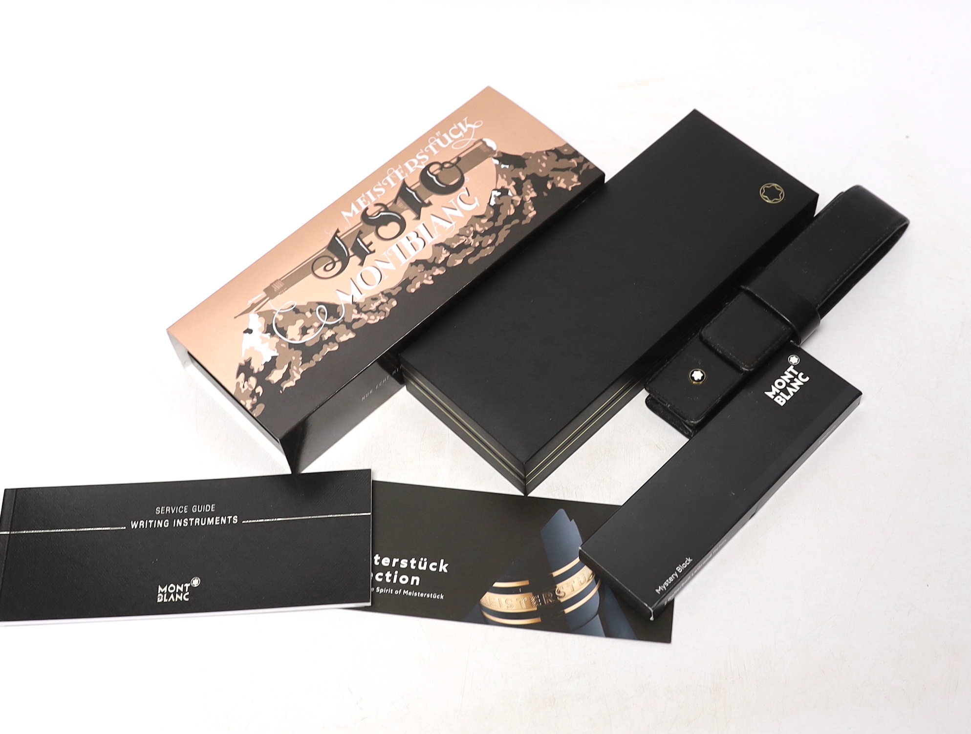 A Montblanc boxed ‘Meistertuck’ fountain pen and a leather cased Montblanc ballpoint pen, a spare box, etc.